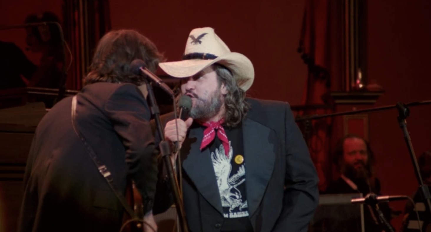 Ronnie Hawkins backed up by The Band